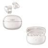 White wireless earbuds shown with their open charging case on a white background. One earbud pair is floating above a closed case labeled SHOKZ, and another open case with earbuds sits below.