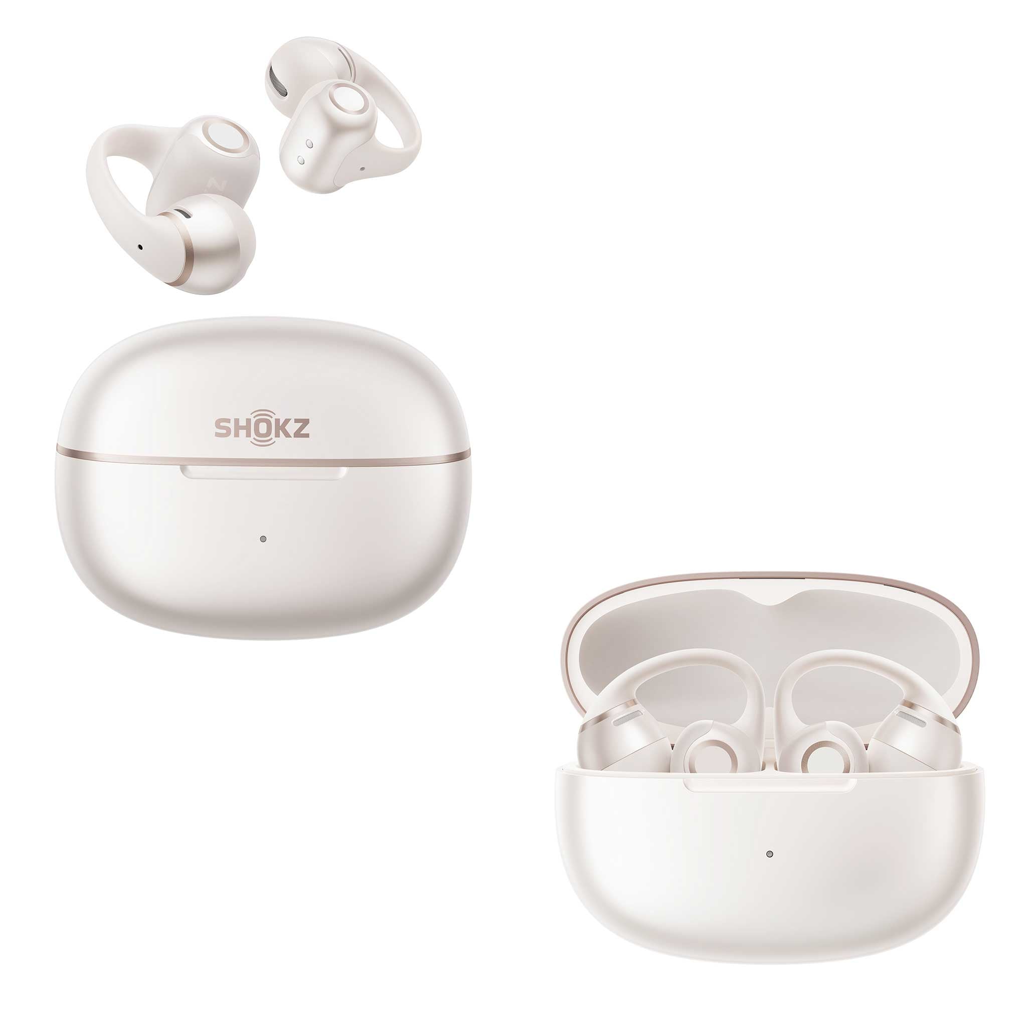 White wireless earbuds shown with their open charging case on a white background. One earbud pair is floating above a closed case labeled SHOKZ, and another open case with earbuds sits below.