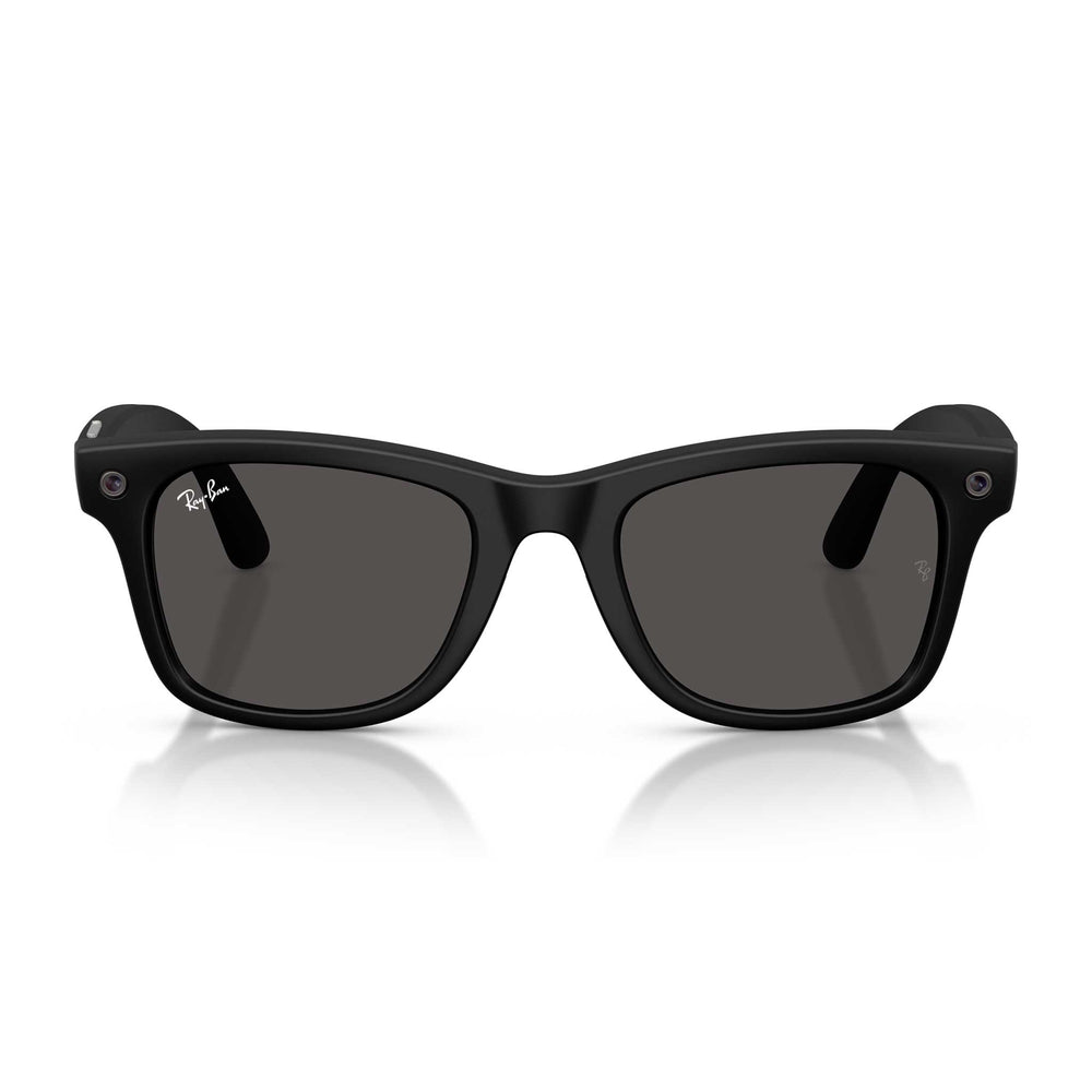 Black Ray-Ban Wayfarer-style sunglasses with dark gray lenses, shown from the front on a white background with a soft reflection below.