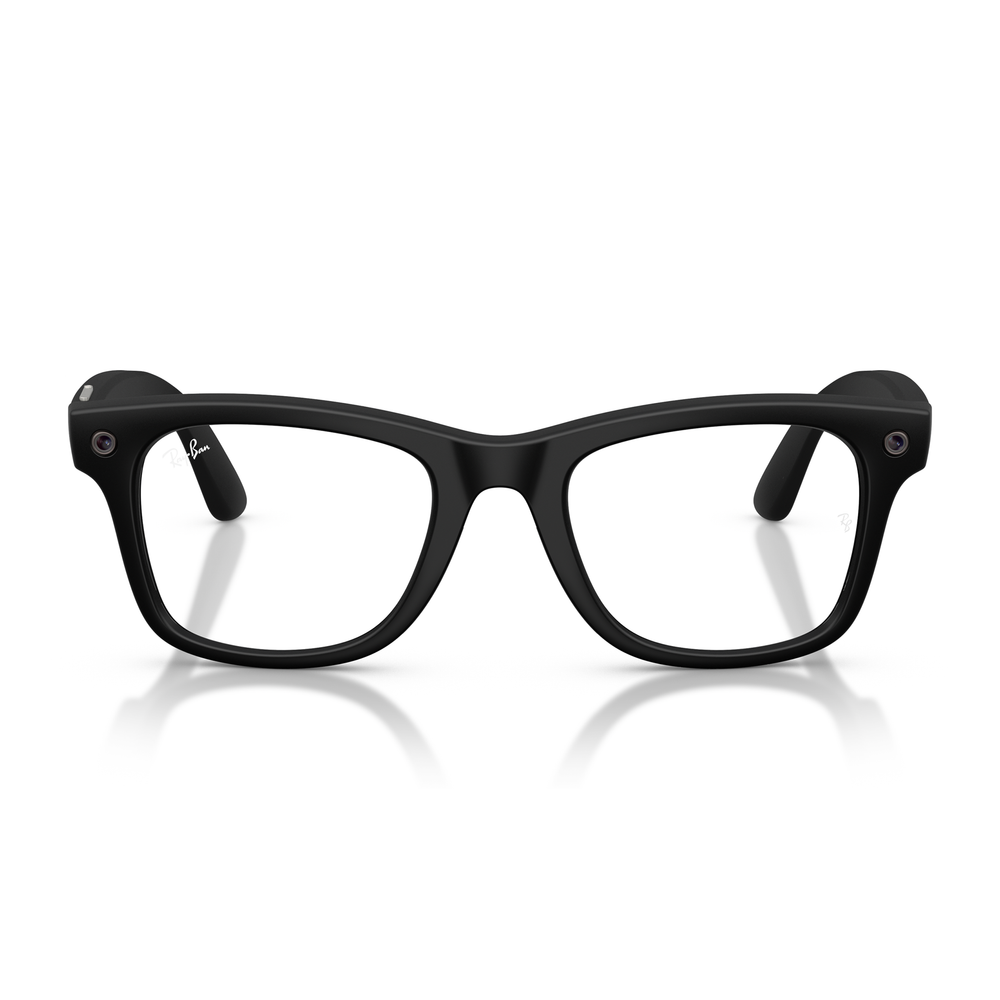 Black smart glasses with a thick rectangular frame and clear lenses, shown on a reflective white background.