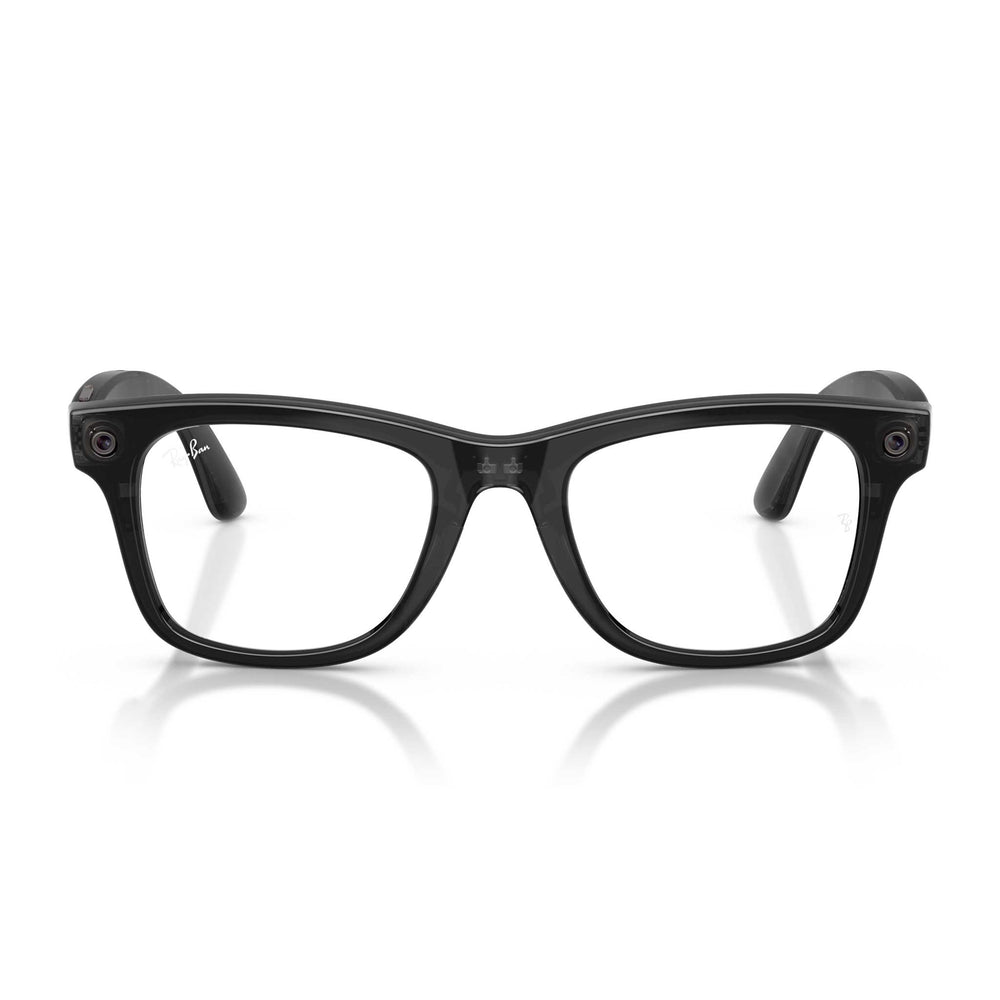 Black smart glasses with a thick rectangular frame and built-in cameras on the temples, shown on a clean white background with a soft reflection.