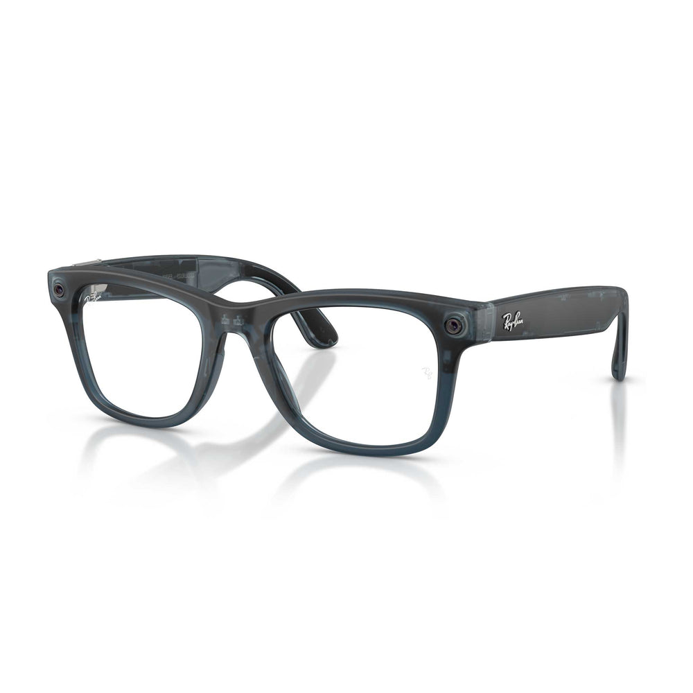Ray-Ban Wayfarer-style eyeglasses with a translucent dark gray acetate frame and clear lenses, shown on a clean white background with a soft reflection.