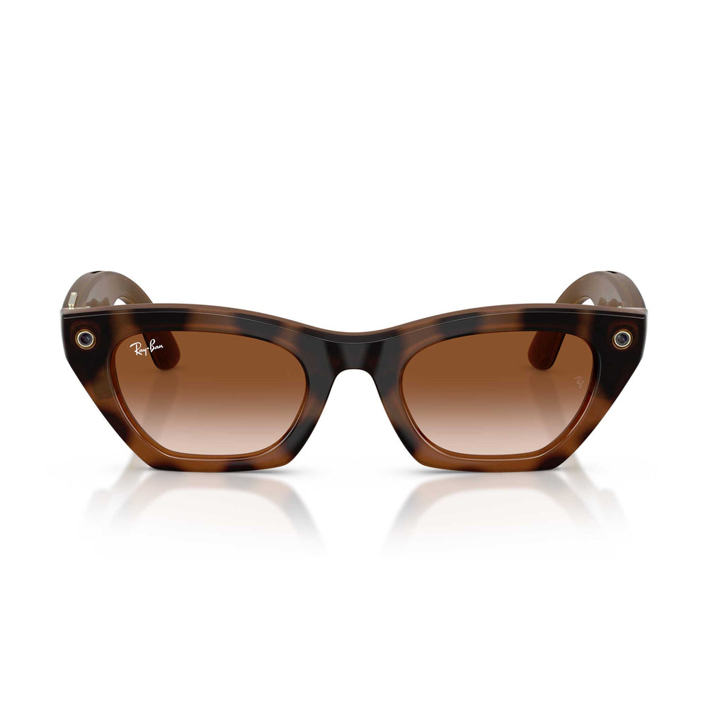 Ray-Ban sunglasses with a brown tortoiseshell acetate frame and gradient brown lenses, shown on a white background with a soft reflection.