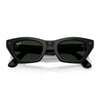 A pair of black smart glasses with green lenses in the folded position against a white background.