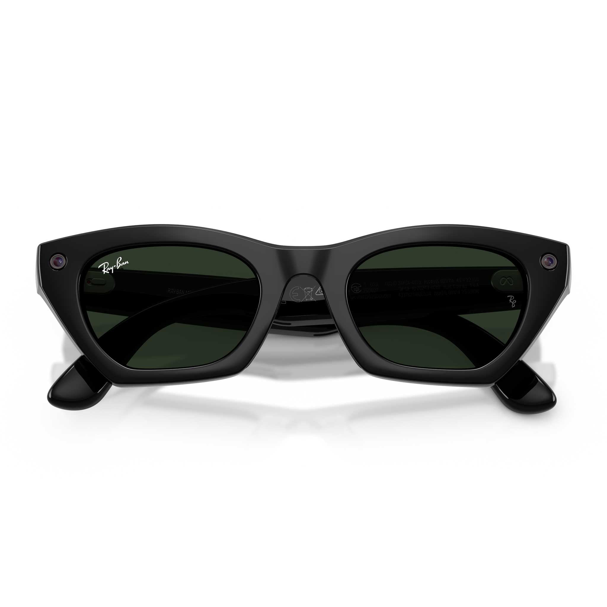 A pair of black smart glasses with green lenses in the folded position against a white background.