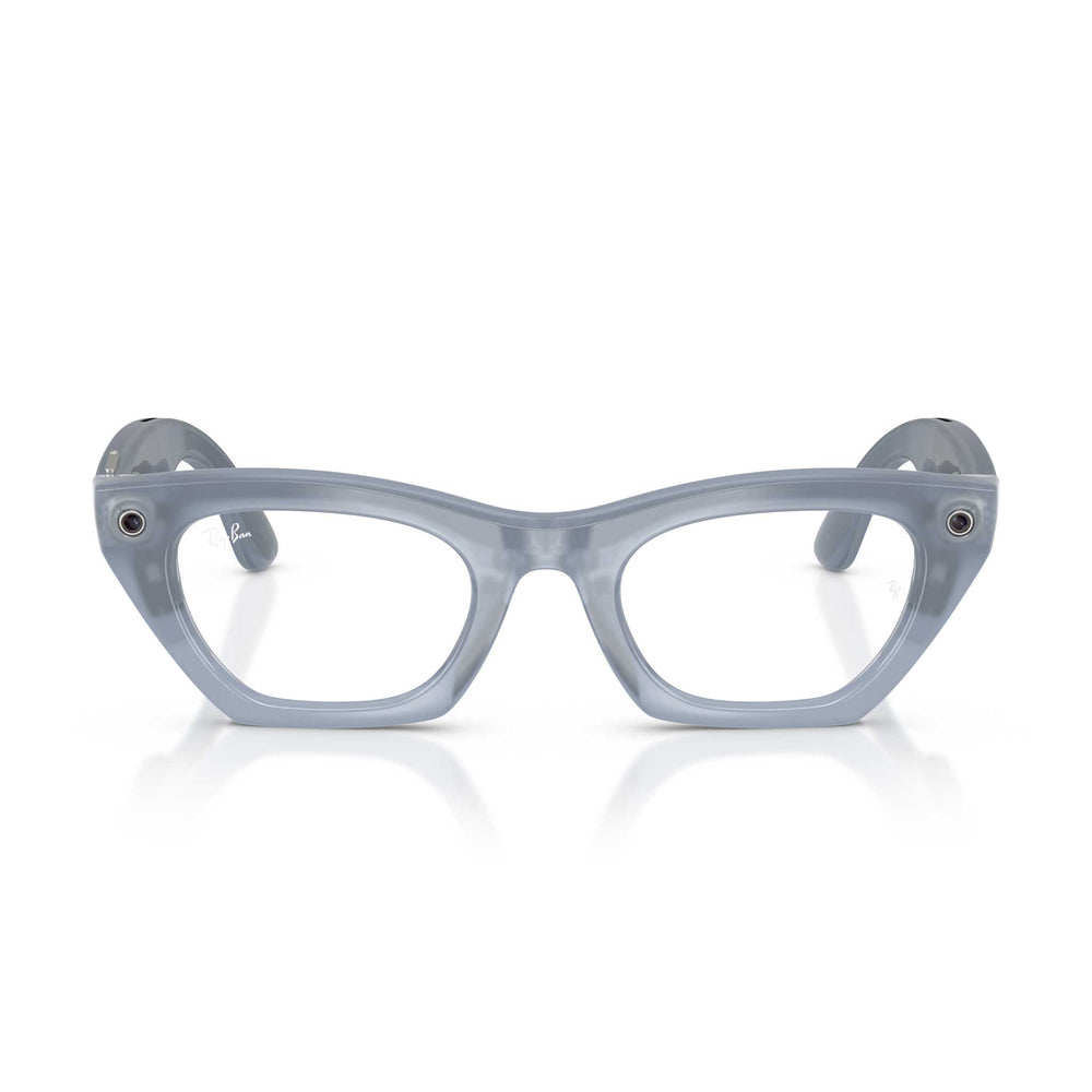 A pair of translucent light blue glasses with clear lenses, displayed on a clean white background with a soft reflection underneath.