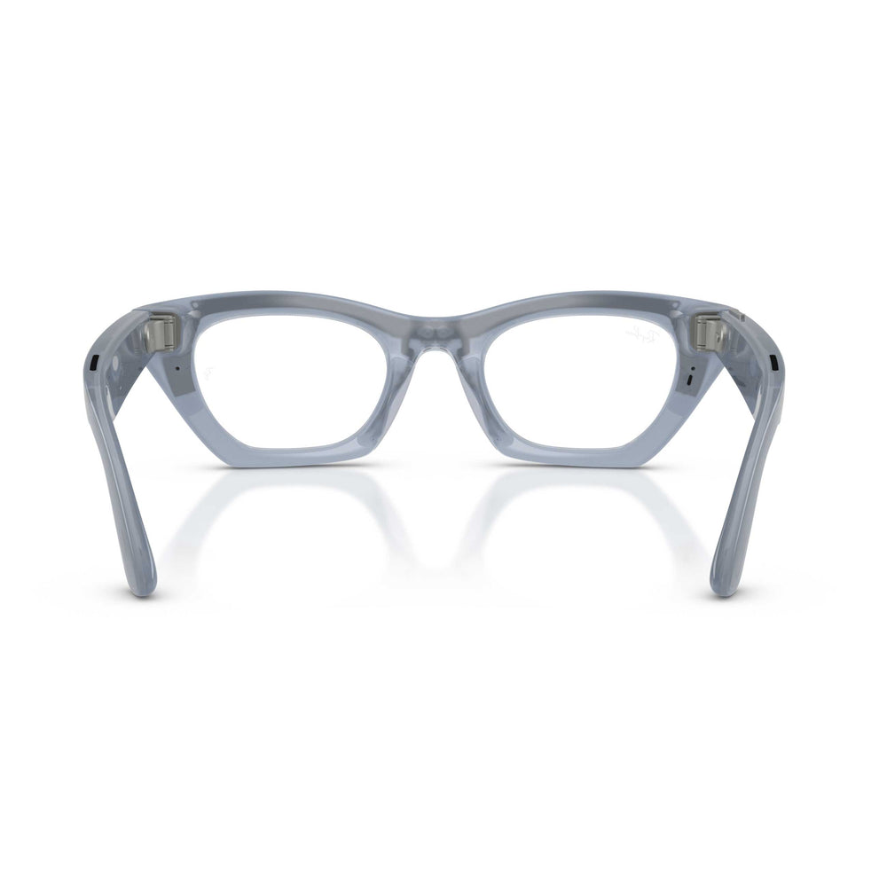 Light blue translucent acetate eyeglass frames with clear lenses, shown from the front on a white background with a soft reflection.