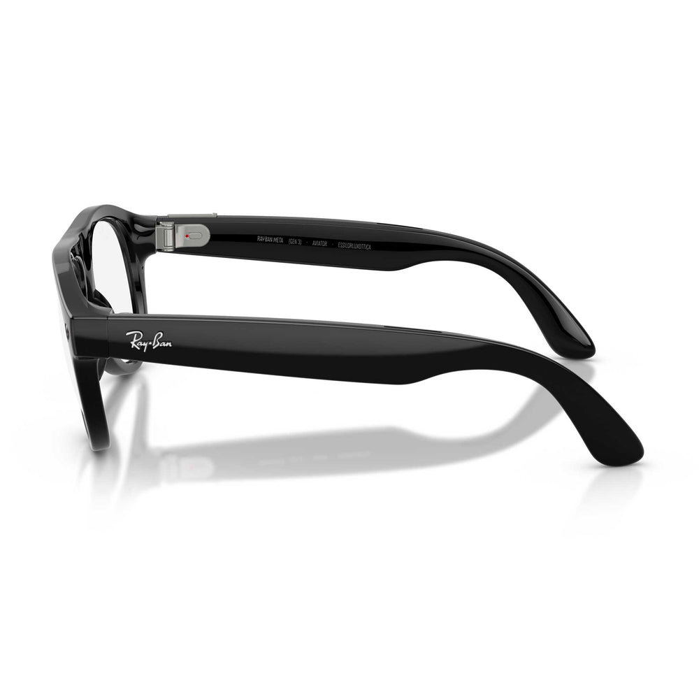 Ray-Ban Aviator eyeglasses in glossy black acetate, shown in a side profile view on a clean white background with a soft reflection.