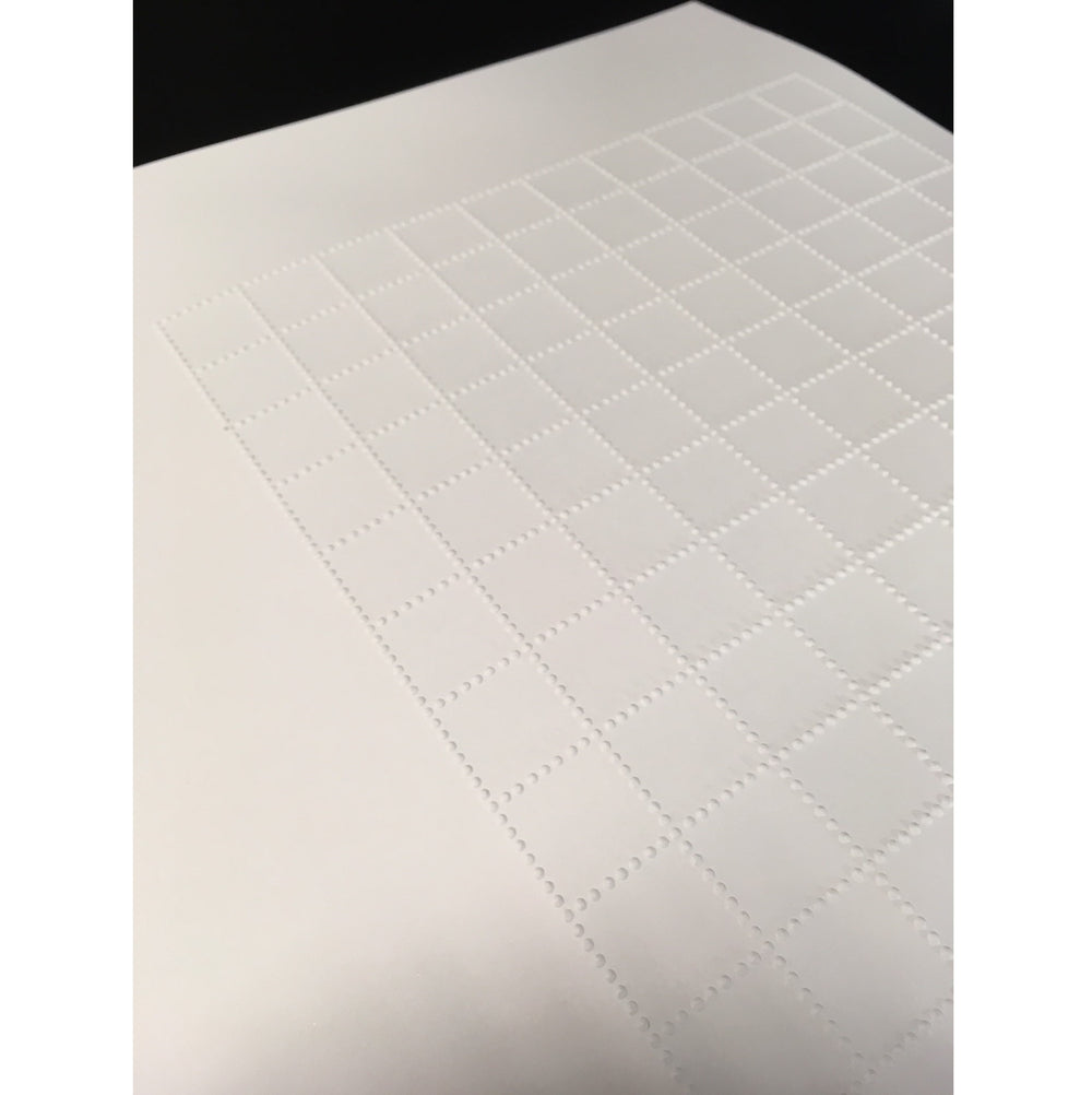 sheaf of tactile graph paper with 2cm squares