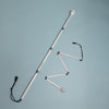Cane unfolded and partly unfolded on a light background