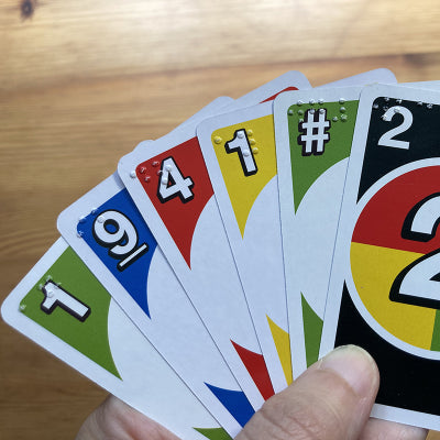 Alternative view of UNO DOS braille card game