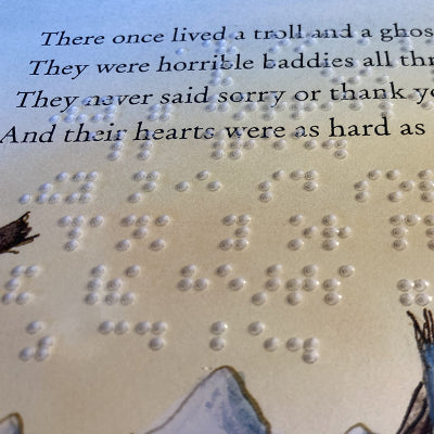 The Baddies page showing print and braille