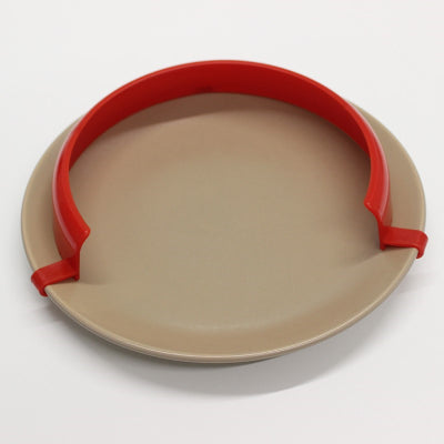 Red plate surround on a brown plate