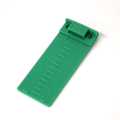 Rear view of braille gauge against a white background