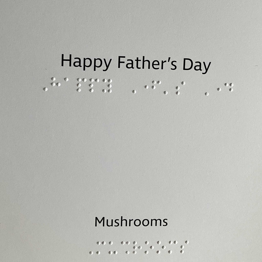 Inside of the card reads "Happy Father's Day" and "Mushrooms" in both print and braille.