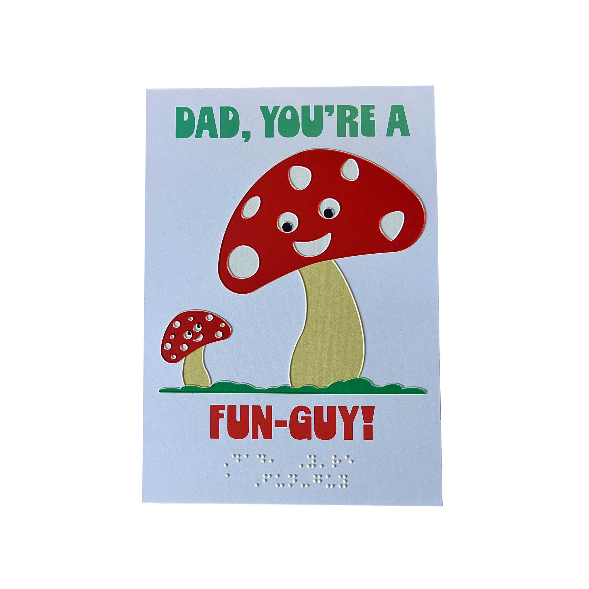 Card with a mushroom design and text and braille 'Dad, you're a fun-guy!' on a light background. 