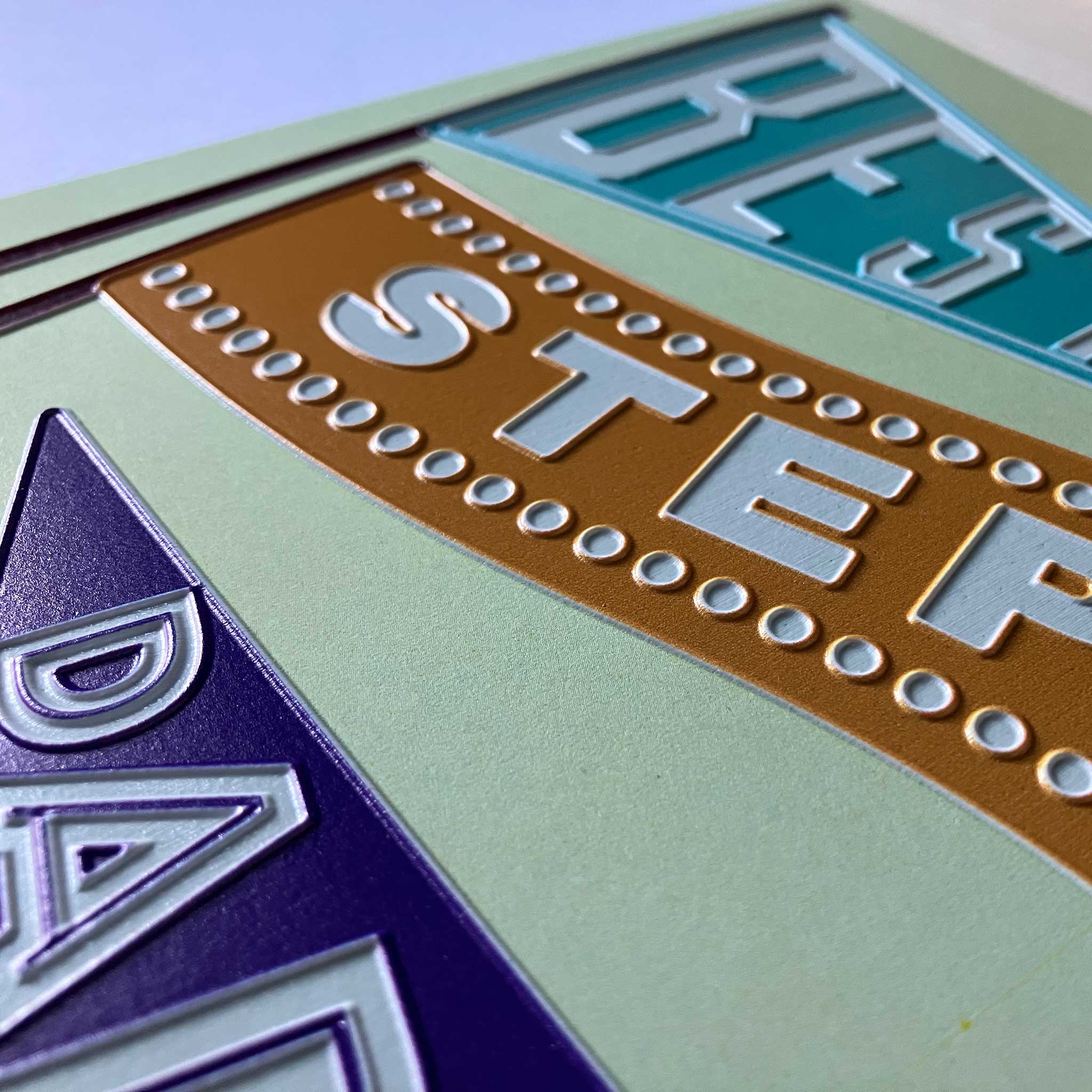 Close-up of tactile flags on Father's Day card