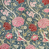 A repeating botanical pattern featuring pink and red protea-like flowers, cream foliage, and pale pink leaves on a dark navy blue background with small white floral details.