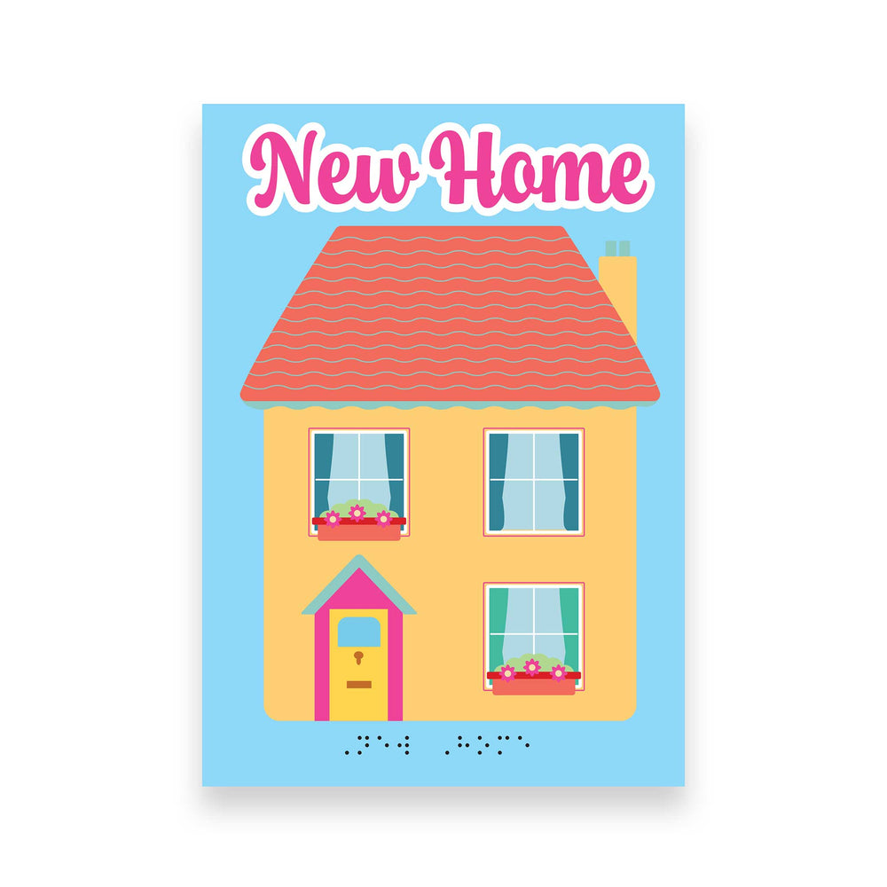 A square greeting card or print featuring a cartoon house illustration with the words 'New Home' in pink at the top and small black Braille text near the bottom, shown on a white background.