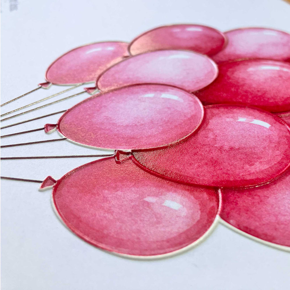 Close-up of tactile image of pink balloons