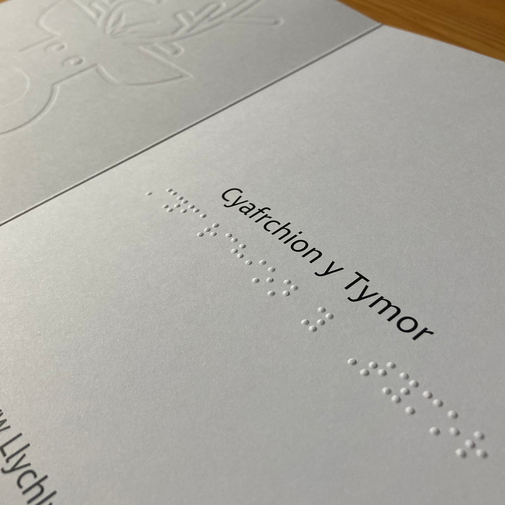 Message inside card in print and braille that reads Cyafrichion Tymor