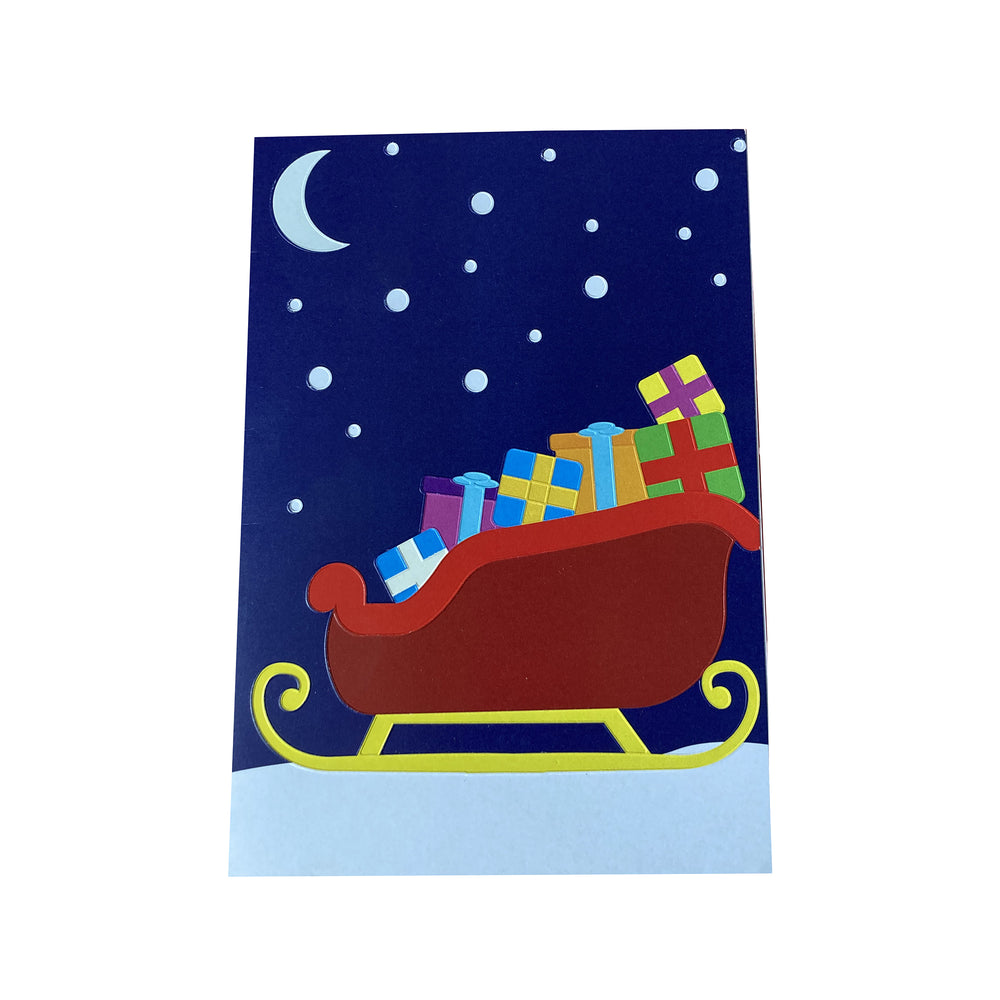 Children's illustration of a red sleigh with colorful presents against a night sky with moon and stars.