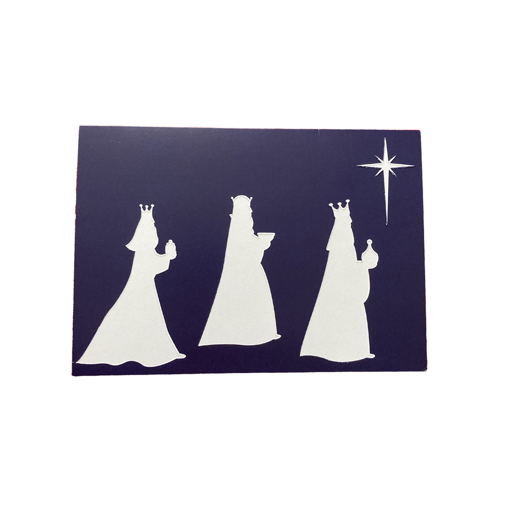 Silhouette of three wise men and a star on a blue background