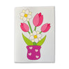 Card with pink tulips and white flowers in a pink vase with heart designs on a white background