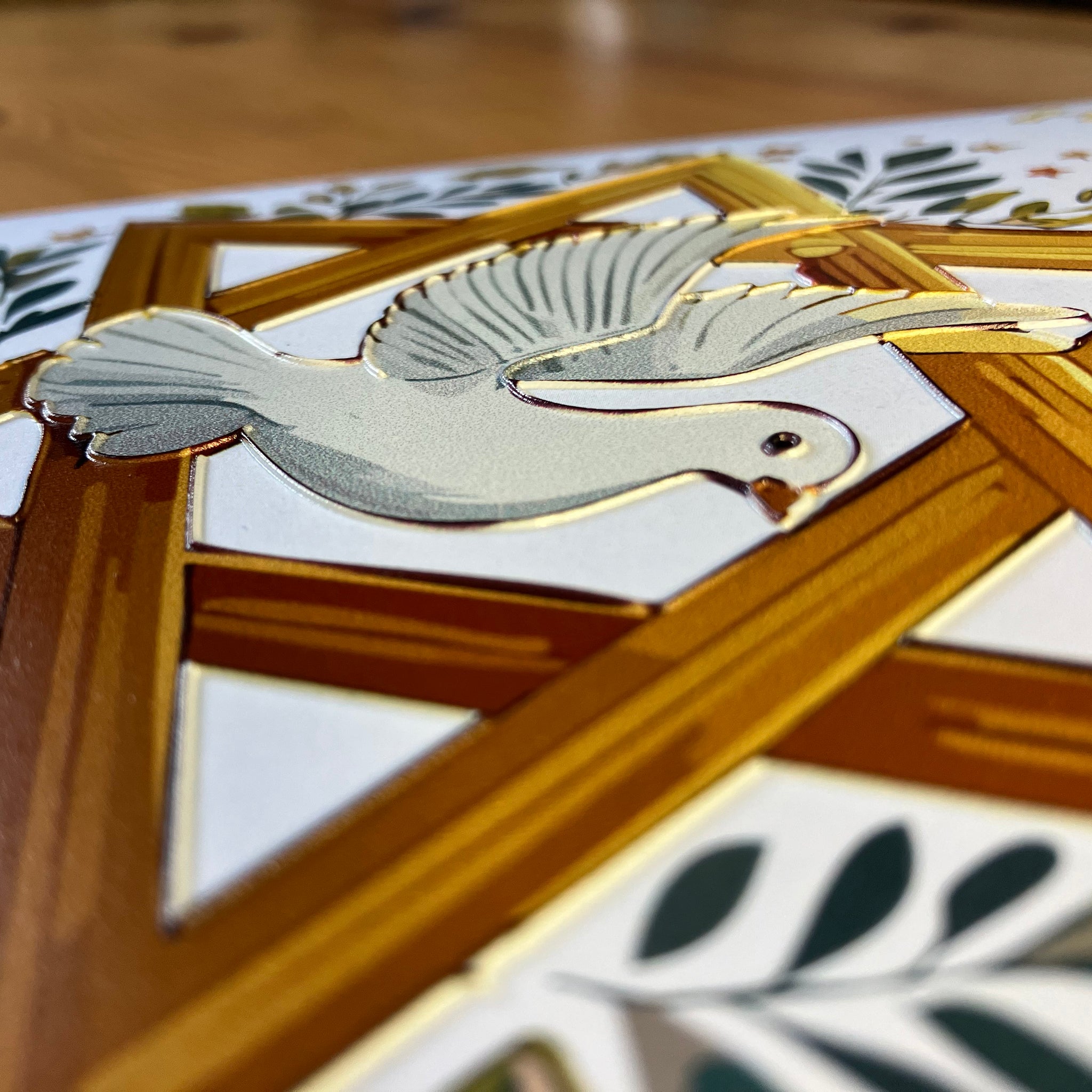Close-up of tactile image of dove and Star of David