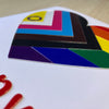 Close-up of tactile heart-shaped intersex pride progress flag on front of Valentine's card
