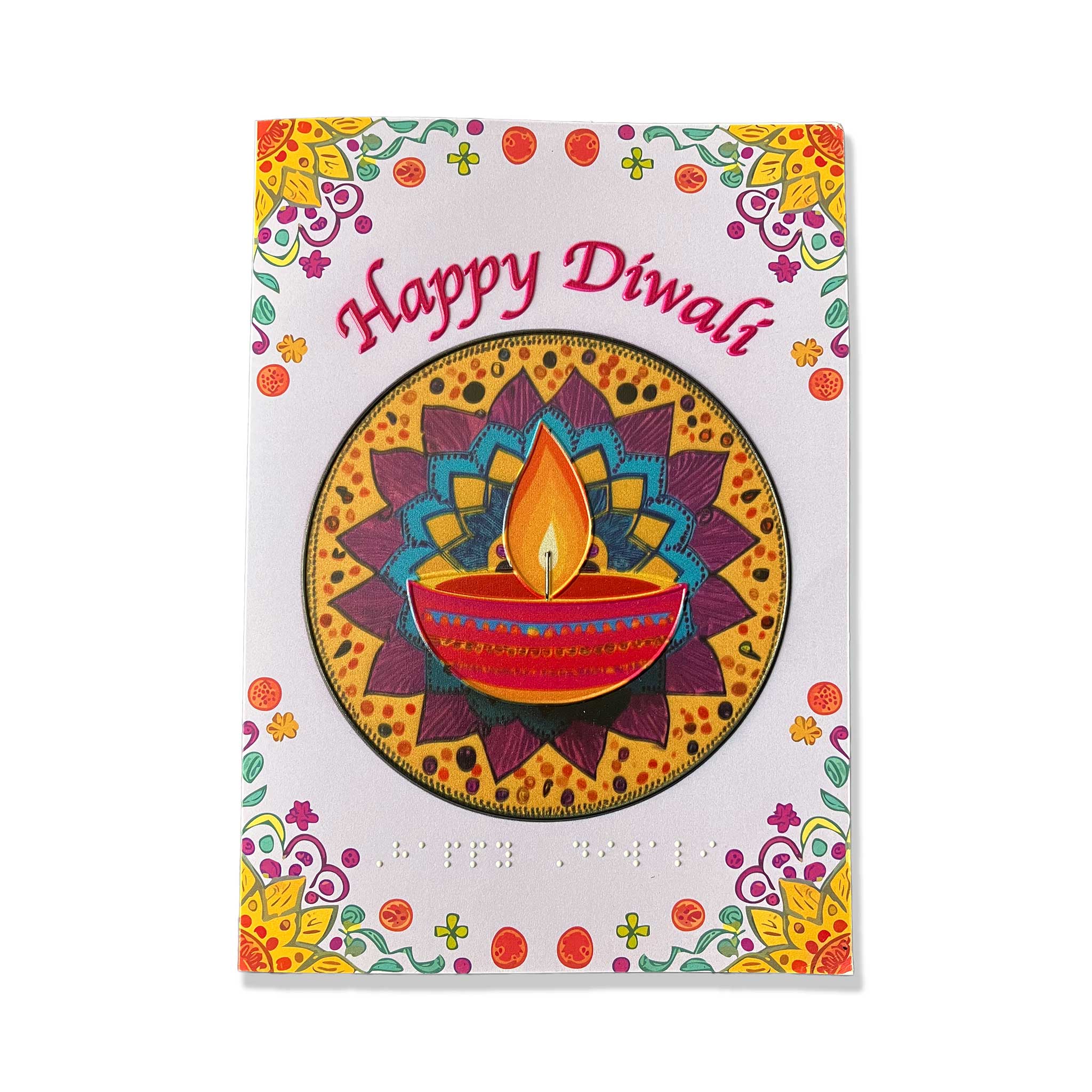 A Diwali greeting card featuring a colorful illustration of a lit diya in a circular mandala design, with 'Happy Diwali' written in red script at the top and decorative floral borders around the edges.