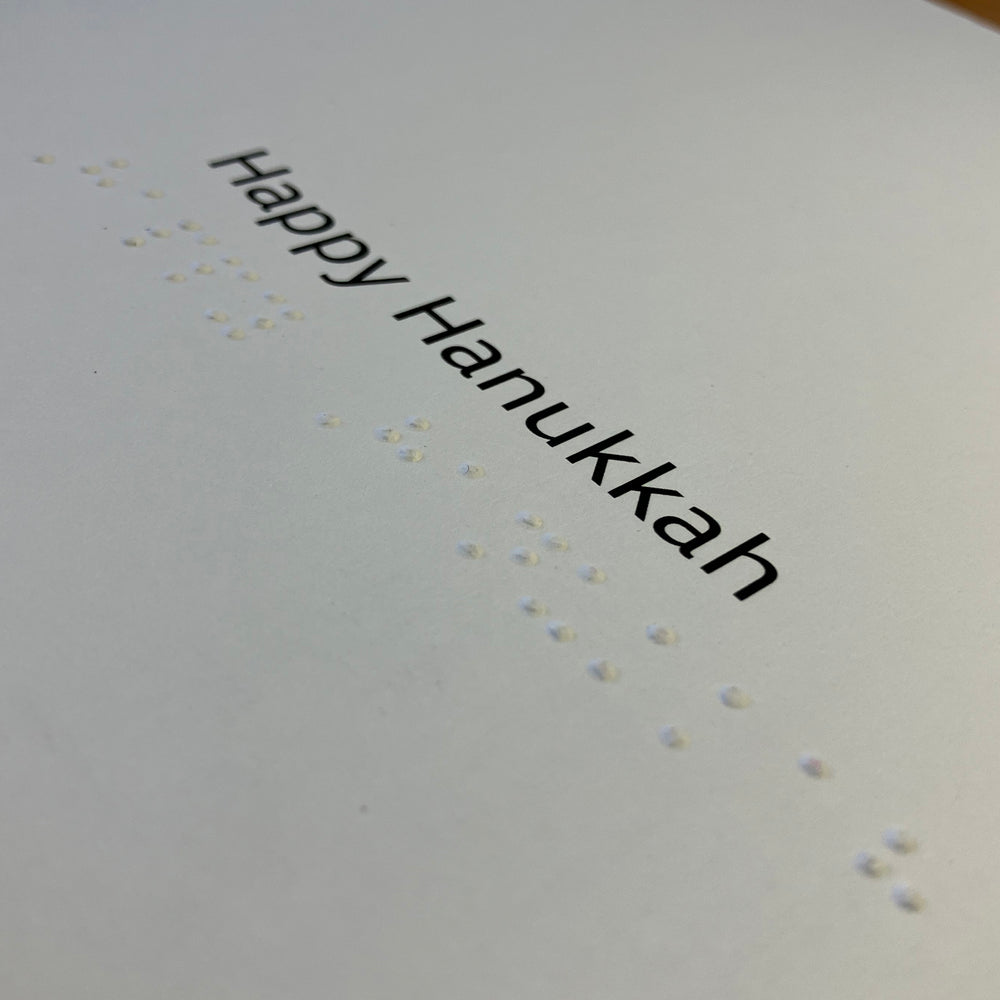 Large print and braille greeting: Happy Hanukkah