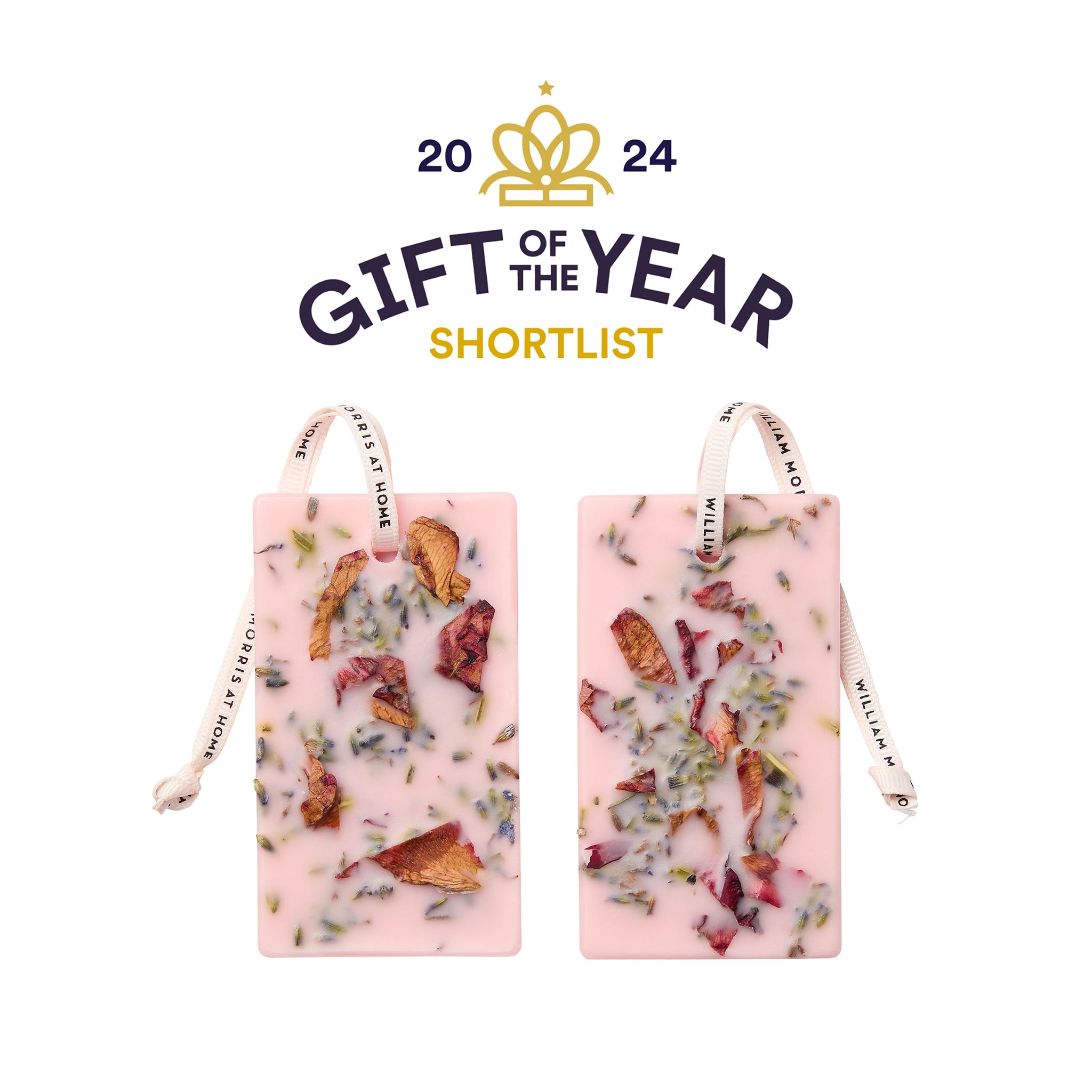 Two wax tablets with visible ingredients on a white background, labeled 'Gift of the Year Shortlist' for 2024.