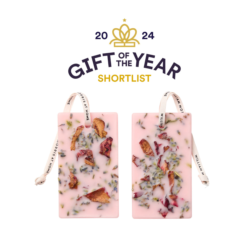 Two wax tablets with visible ingredients on a white background, labeled 'Gift of the Year Shortlist' for 2024.