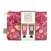 Set of William Morris hand care products with a floral pouch on a white background