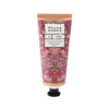 Hand cream tube with floral design on a white background