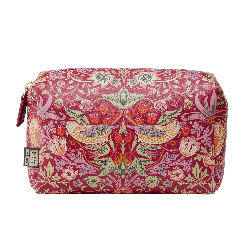 Floral and bird patterned wash bag on a white background