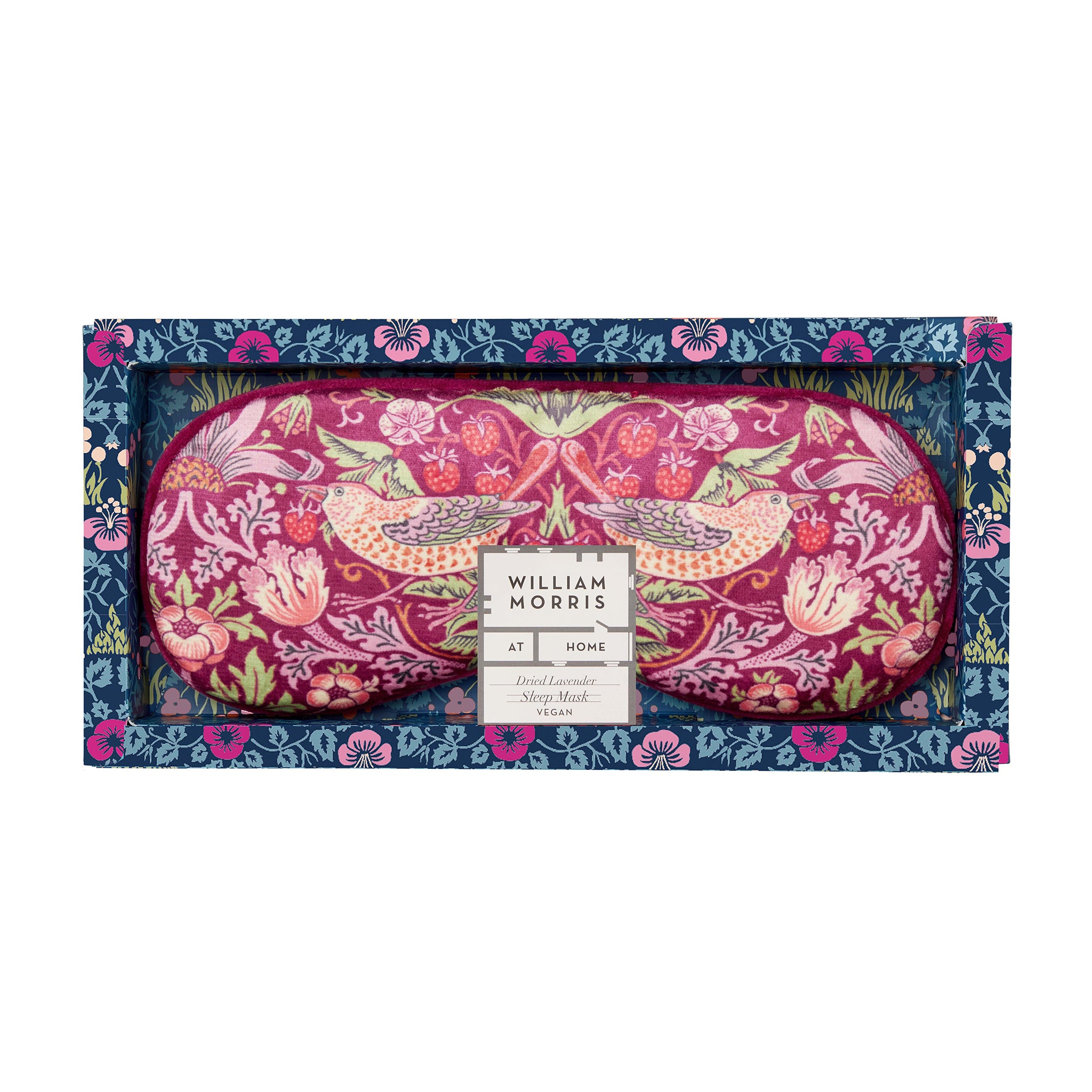 Decorative floral and bird patterned eye mask in a colorful box.