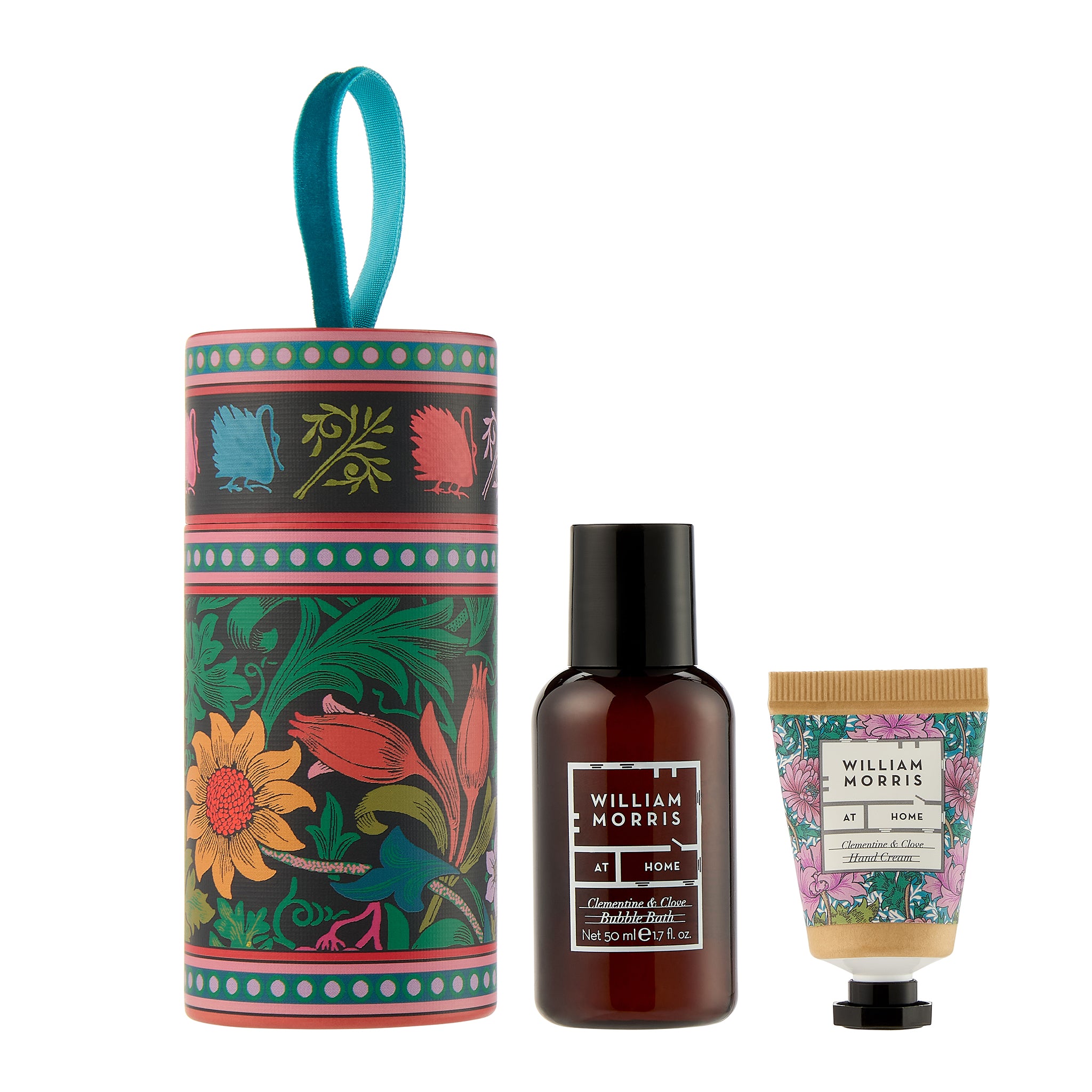 Set of William Morris home products including a cylindrical container, bottle, and tube on a white background.