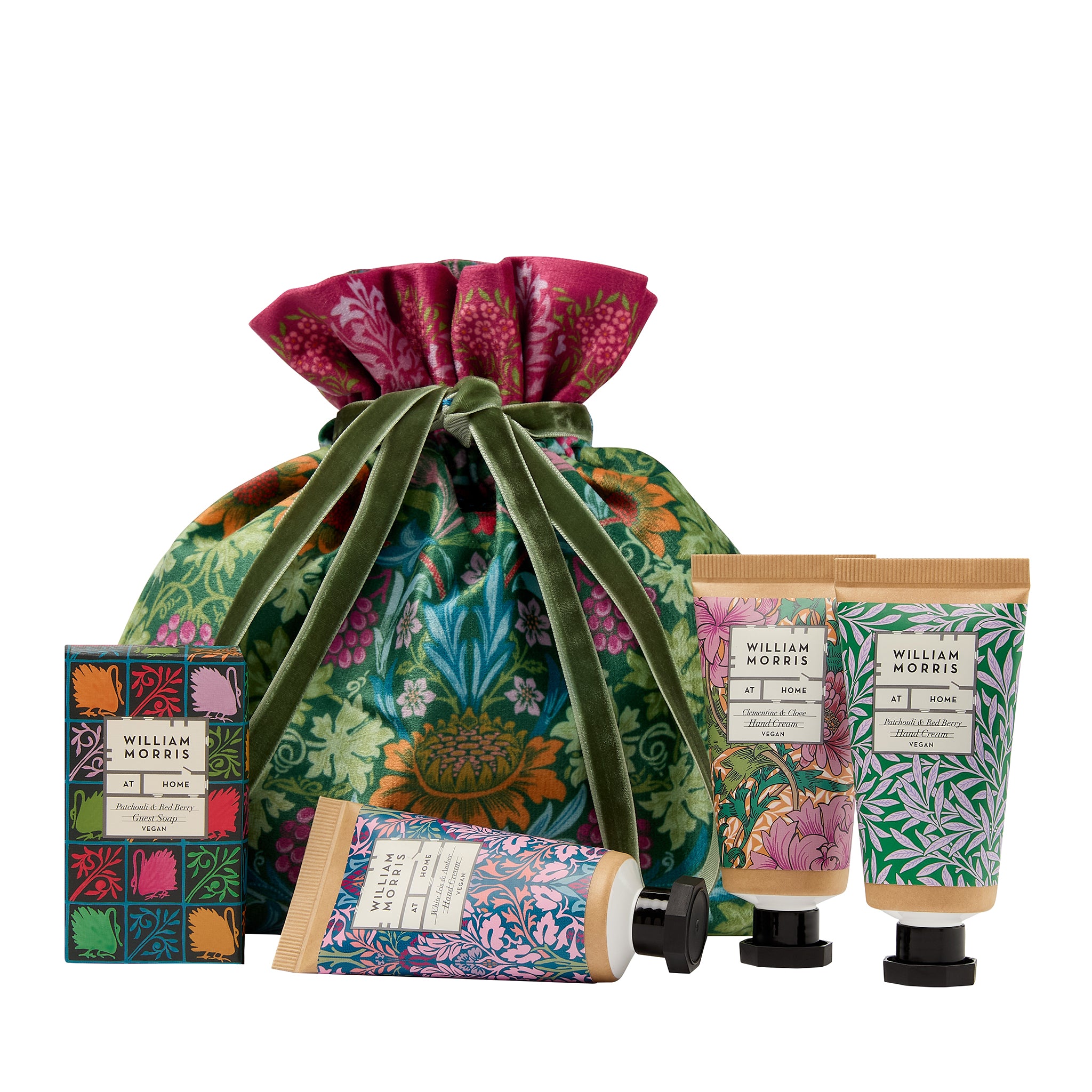 Set of William Morris-themed products including a drawstring bag, soap, and hand cream on a white background.