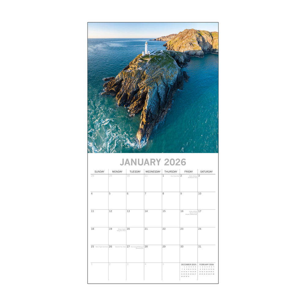 Calendar page for January 2026 with a lighthouse on an island design.