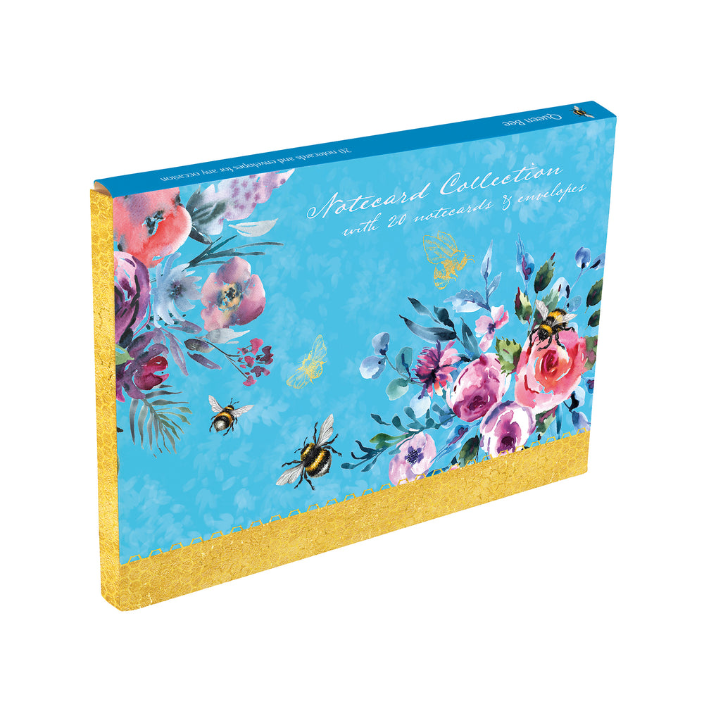 Floral notecard collection with bees on a blue background.