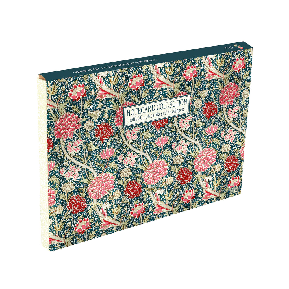 Angled view of floral notecard collection box with intricate design on a white background.