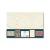 Notecard pack with patterned paper envelopes against a white background.