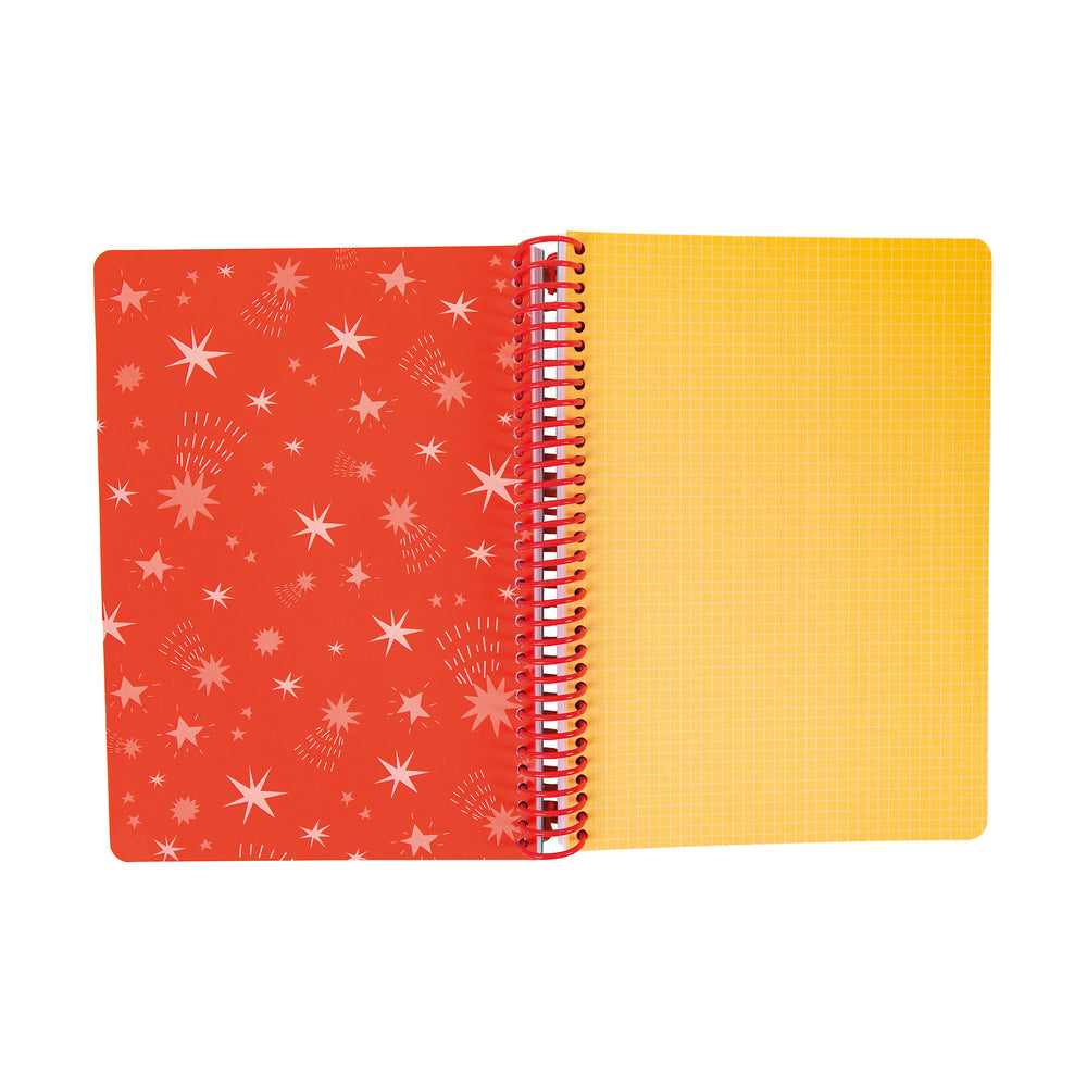 Open notebook with red cover and yellow pages.