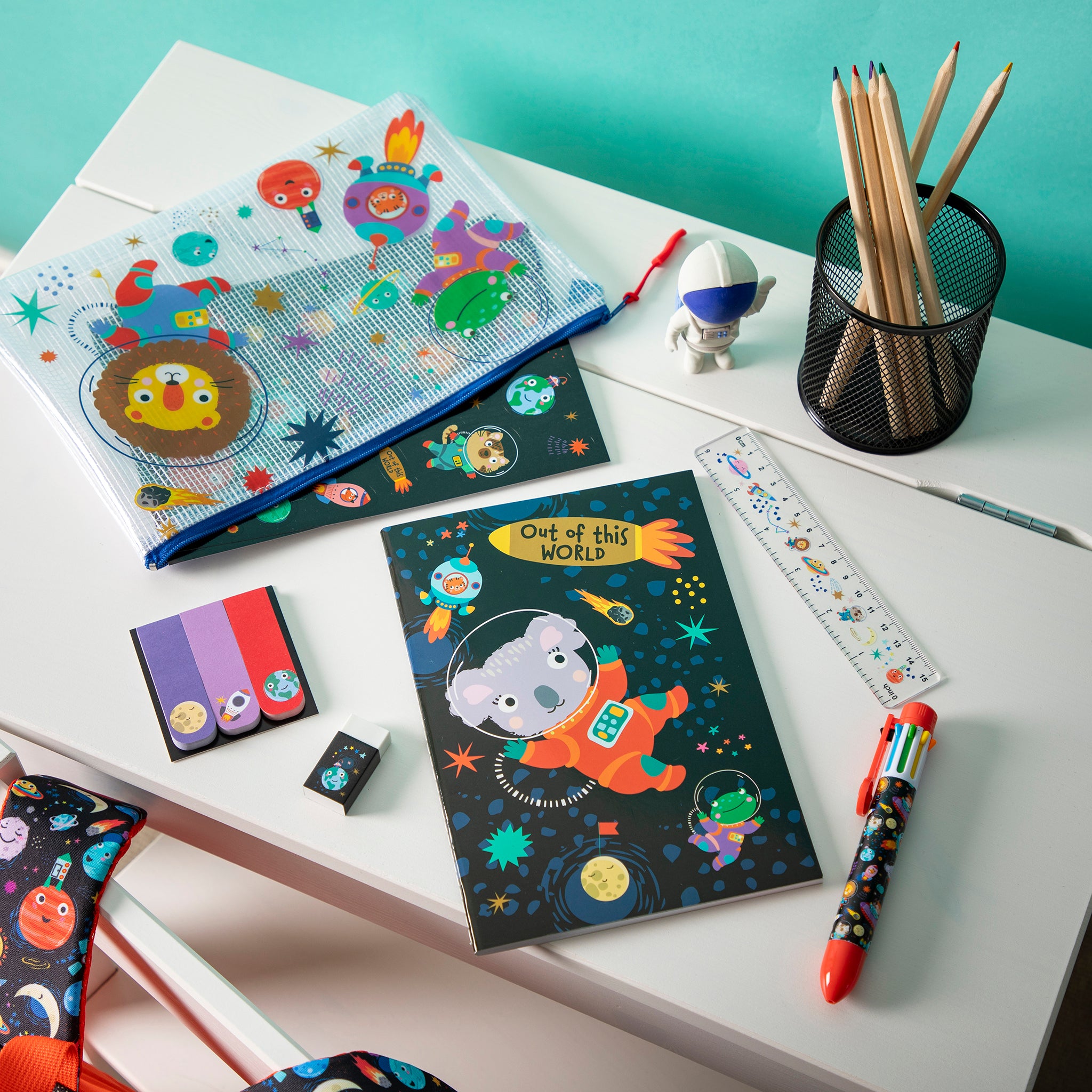 Stationery set open on a child's desk.