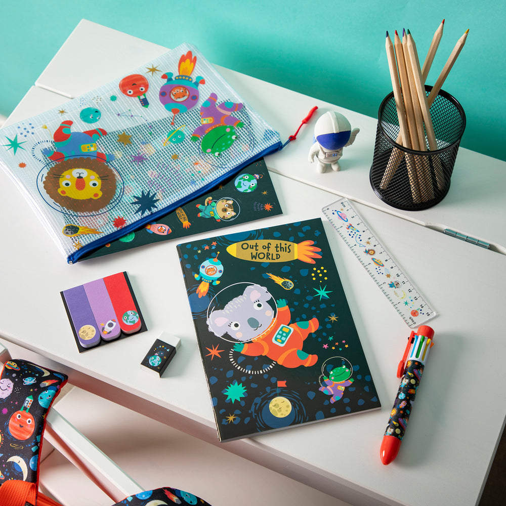 Stationery set open on a child's desk.