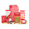 Assorted Christmas-themed snack products including boxes and bags on a white background
