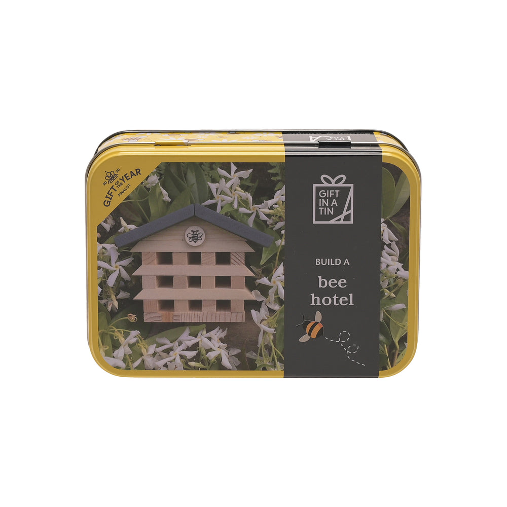 Gift in a tin packaging with a bee hotel model and floral design