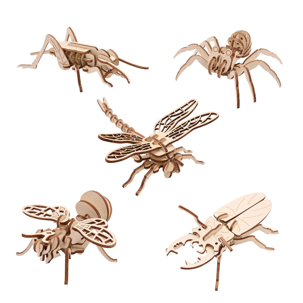 Set of wooden insect models on a white background
